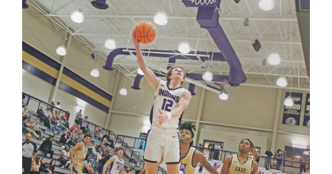 Lumpkin County junior Stephen Sherrill drives in for a shot versus East Hall during the Gold City Shootout last week.