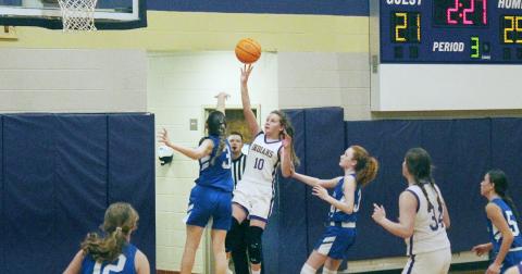 Lumpkin eighth grader Emmie Reese goes up for a basket against the Fannin defense in last week’s game.