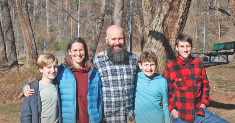 The Skogman family of hikers includes, from left, Grayson, Joni, Darrell, Baxter, and Jasper.