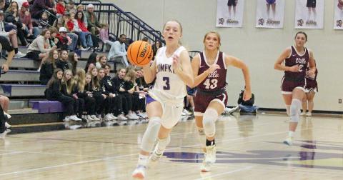 Ciera Brooks breaks away from her Dawson defender. The junior finished with nine points and four steals.