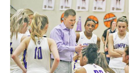 Lumpkin County girls basketball head coach David Dowse speaks to his team during a timeout in last week’s Senior Night game.  Lumpkin is competing in the Region Tournament this week.