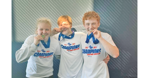 Lumpkin County High School had three wrestlers who became State Champions last week, including (from left) Greta Garbuzovas, Nathan Nielsen, and Austin Marshall.