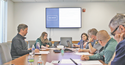 Members and staff of the Lumpkin County Recycling and Litter Committee debate assignments and procedures at their introductory meeting on March 16.