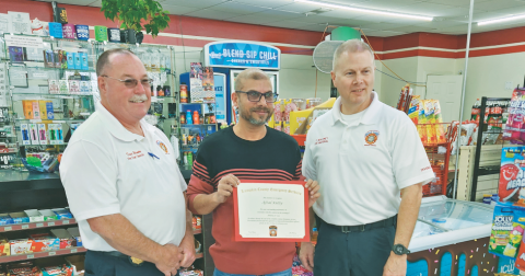 Afzal Kutty of the local “Disco” Marathon gas station was recently recognized by Lumpkin County Fire Chief David Wimpy (left) and Fire Marshal Chris Maloney. Kutty acted quickly on the night of January 15 to extinguish a blaze that occurred after a driver of a Jeep lost control and collided with the gas pump.