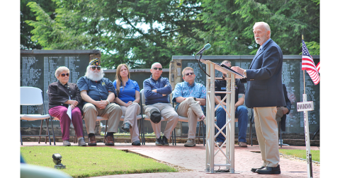 Vietnam veteran Paul Hanson addresses the crowd at Veterans Park during the annual Memorial Day ceremony on May 27. Hanson has played a leading role in the biannual effort to place Memorial Flag Markers along Dahlonega’s roadsides.