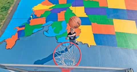 Third grader Beau Guy has managed to memorize all the state capitals, while working on his jump shot at the same time, thanks to a super-sized map of the U.S.A. in his driveway.