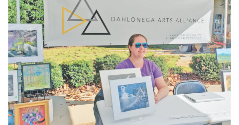 Meagan Garris with the Dahlonega Art Alliance was one of participants in the 2021 Love In Action Fair. The event takes place again Saturday, May 13, 11 a.m.-2 p.m. at St. Elizabeth’s, 1188 Hamp Mill Road. (photo submitted)