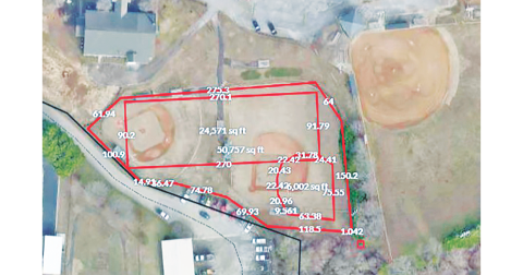 In this aerial photo Yahoola Creek Park baseball fields four and six are visible, with red lines indicating the possible locations of a future artificial turf multipurpose field and baseball diamond.
