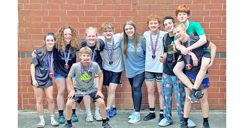 Lumpkin wrestlers gather together following their very successful meet.