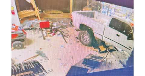 Security cameras captured the scene as of an out-of-control driver plowed through the front doors of Moore's Hardware just before midnight Friday evening.