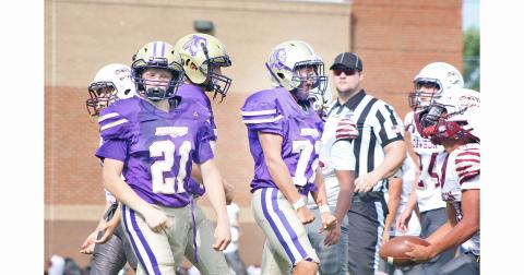 Dominick Alvarez and Xander Nielsen celebrate a big tackle for the Indians during this week’s game.