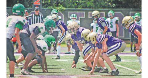 The Lumpkin County Middle School offensive line squares off with Franklin’s defense during last week’s scrimmage game.