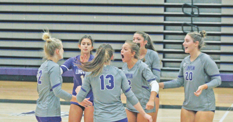 The Lumpkin County team was fired up after taking a set two victory over Gainesville High School.