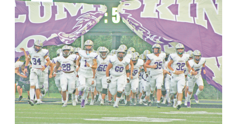 Lumpkin County storms the field to take on the Temple Tigers.