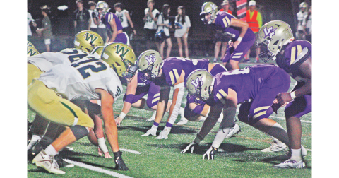 The Lumpkin defensive line squares off with the Wesleyan Wolves in last week’s game as the Indians came away with a 30-21 victory.
