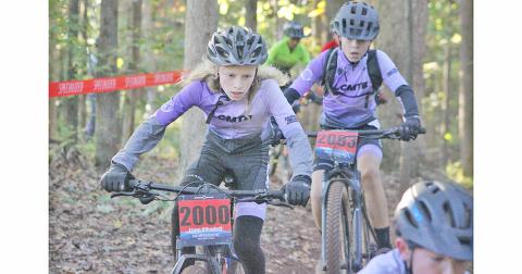 Liam Alhadeff races through the course on his way to a first place finish.