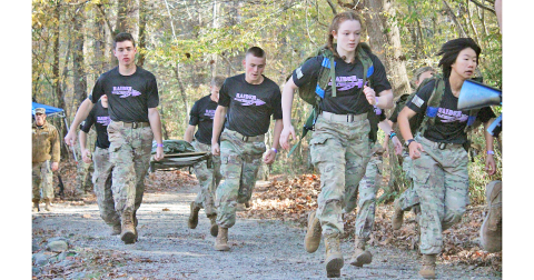 The Raiders squad competes in the Cross Country Rescue event during the All-Service State Championships.