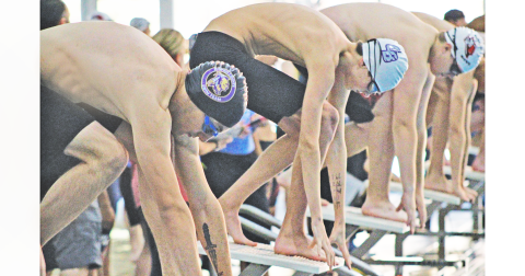 Timothy Miller prepares to dive into his lane ahead of one of his races. (Photo submitted to The Nugget)