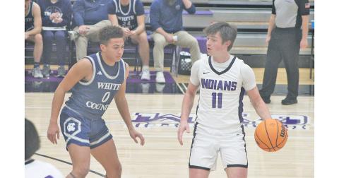 Lumpkin County's Jac Chambers looks for an opening against the Warriors.