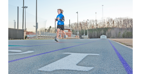 LCHS junior Wyatt Windham practices on the newly-surfaced high school track.  The standout athlete said the new surface should help prevent injuries and allow runners to wear the proper track cleats for racing.