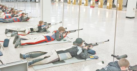 The Lumpkin County High School rifle team scopes out their targets during last week’s meet.