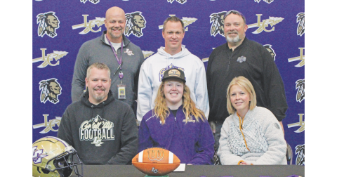 Pictured (front row, from left) are Adam Scott, Cooper Scott and Megan Scott. Back row are Principal Billy Kirk, Head Coach Heath Webb and Athletics Director Steve Horton.