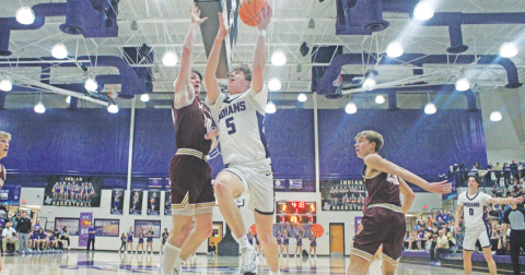 TJ Gaddis lands a layup during the teams game against Dawson County.