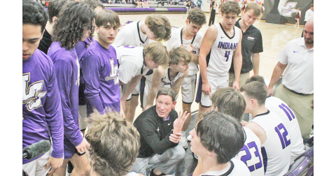 Lumpkin boys basketball Head Coach Chris Faulkner talks with his team during a timeout in the Indians’ game versus Dawson County last week.