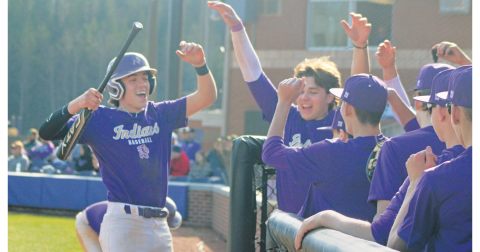 Chase Smith and the purple squad celebrate a run during their preseason game. 