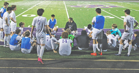 Head Coach Brent Howell rallies his Lumpkin County team during halftime.