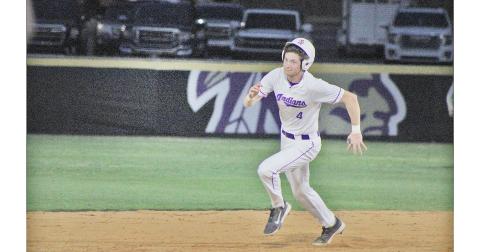 Lumpkin County’s Mason Hester rounds second after a huge hit that he stretched for a triple.