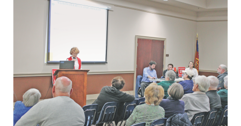 Dahlonega resident Katherine James, a staunch opponent of the DiVine Village RV park, discusses potential environmental impacts of the project as representatives of the Georgia EPD look on.