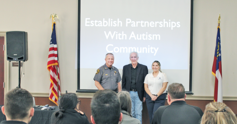 Sheriff Stacy Jarrard, Dennis Debbaudt and Dr. Lyndsy Macri (left to right) spoke to law enforcement officers and other public servants in the Parks & Rec meeting room last Wednesday.