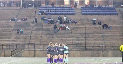 The Lumpkin County High School Indians huddle up before their game.