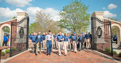 UNG President Michael Shannon and First Lady Jessica Shannon lead the way through the new gates on the drill field in Dahlonega. (Photo courtesy of UNG)