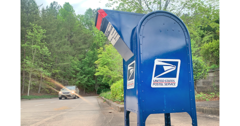 If you're shipping Dahlonega-to-Dahlonega mail it's best to avoid the big blue bin for now and hand your letter, package or parcel to an actual employee inside the post office.