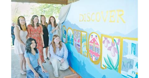 Helping to unveil the new Discover Dahlonega mural were (back row, from left) UNG student Grace Witkowski, UNG student Joanna Zwemke, DDA Main Street Manager Skyler Alexander and DDA Director Ariel Alexander. (Front row, from left) UNG student Stephanie Leyva and UNG student Alexis Phillips.