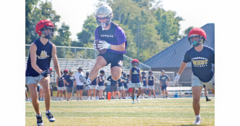 Indians’ player Colton Lee leaps into the end zone during the seven-on-seven event at East Forsyth last week.