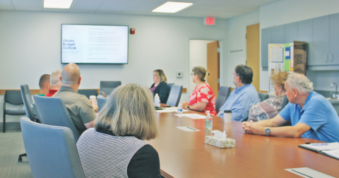 Chestatee Regional Library Director Leslie Clark and Business Manager Jonathan Smith present the local library's 2025 budget outlook to the Lumpkin County Board of Commissioners.