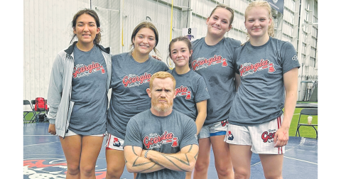 Mattie Mendoza, Natalie Mendoza, Cadence Grulla, Faith Jones, Greta Garbuzovas and Team Alpha Coach Micah Goss represented Lumpkin on the National stage.