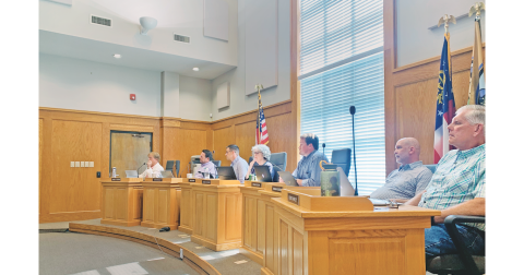 Dahlonega City Council members recently approved a new ordinance that will regulate wall signs while allowing for more freedom for holiday inflatables.