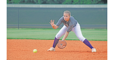 Julianna York prepares to make a defensive stop during the Lumpkin County High School softball team’s practice.