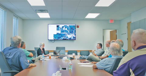 Members of the Yahoola Creek Reservoir Study Committee listen in as Planning Director Rebecca Mincey outlines the key priorities of the 2020 Reservoir Master Plan.