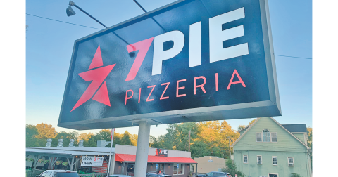 The pole-mounted sign at 7 Pie Pizzeria will remain in place after narrowly receiving approval by the Dahlonega City Council.