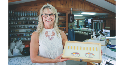 Crisson Gold Mine co-owner Tammy Ray displays local gold to be used on the Capitol Dome in Atlanta.