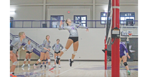 Lumpkin County player Maggie McKenzie lines up a spike during a scrimmage game last week.