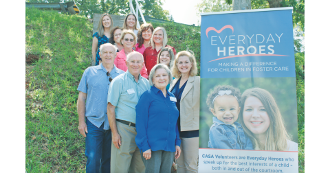 Pictured from CASA are Georgia Volunteer of the Year Pam McCampbell (front), Board Member John Seymour and Executive Director Della Lago (second row), Board Chair Ben Wallace and Advocate Supervisor Katie Dunlap (third row), Board Member Karen Powell and Administrative Assistant Debbie Schofield (fourth row), Outreach Coordinator Fran Parks and Georgia Executive Director Jen King (fifth row) and Georgia Program Operations Director Deidre Hollands and Georgia Marketing Director Rachelle Mosley (top row).