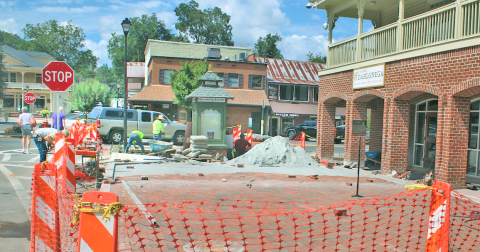 Workers with Hasbun Construction lay bricks on the plaza in front of the Visitors Center in downtown Dahlonega. The project is on schedule to be completed ahead of the busy Gold Rush festival in October.