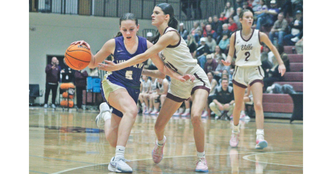 Lumpkin County’s Emmie Kate Reece gets past a Dawson County defender in the two team’s recent matchup.