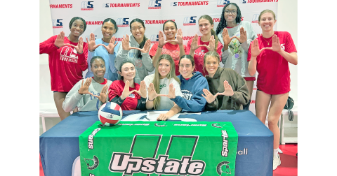 Morgan Powell and her A5 Volleyball teammates celebrate her commitment to the University of South Carolina Upstate.